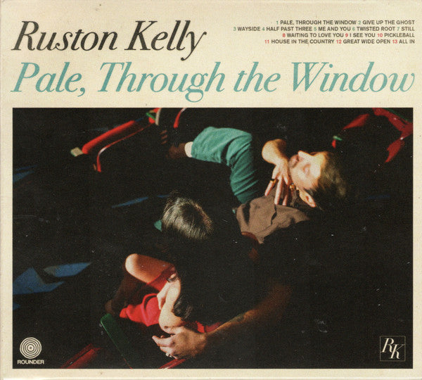 PALE, THROUGH THE WINDOW